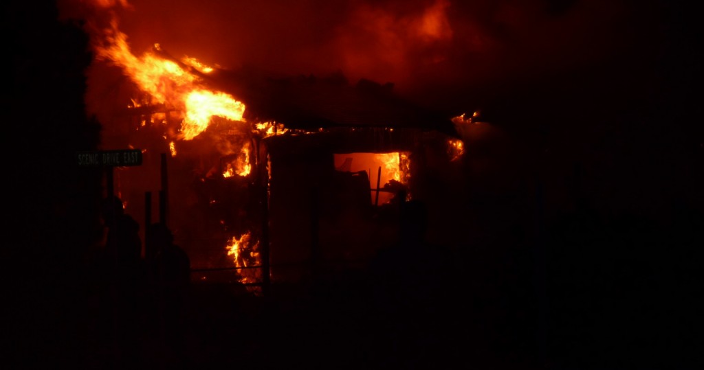 Fire crews work to put out a house fire at 121 N. Scenic Drive East, Washington, Utah, April 20, 2013 | Photo by Andy Griffin, St. George News