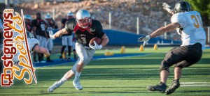 Former Desert Hills star Brennan Adams catches a pass for the Dixie Rebels Saturday night, Utah Shock at Dixie Rebels, St. George, Utah, April 13, 2013 | Photo by Dave Amodt, St. George News