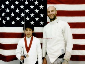 UFA coach Parker Miner (right) poses with Youth 14 Foil event gold medalist Raphael Pinna at the Desert Blades Youth Tournament in Las Vegas | Photo courtesy UFA