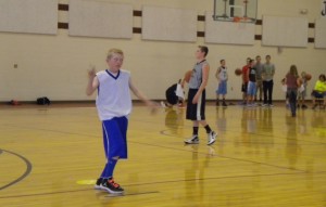 Ky Brown, of Beaver, watches intently the result of his free throw. He was one of more than 70 youth who participated in the basketball skills competition at the Utah Summer Games, Cedar City, Utah, June 19, 2013. | Photo by Darren Cole, St. George News