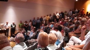 The line of speakers at the Utah's Water Future public forum. Speakers consisted of Washington County officials, Kane County officials, city  mayors, members of Citizens for Dixie's Future, and county residents unaffiliated with an particular group, St. George, Utah, July 26, 2013 | Photo by Mori Kessler, St. George New