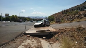 A single-vehicle rollover occurred on Bluff Street after the driver veered off the road, St. George, Utah, July 30, 2013 | Photo by Mori Kessler, St. George News