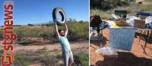 A volunteer triumphantly displays a tire he found alongside the trail, St. George, Utah, Sept. 21, 2013 | Photo by Zach Windsor, St. George News 