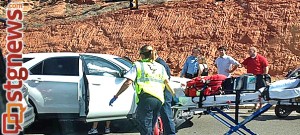 Paramedics respond to an accident at the intersection of Red Cliffs Blvd. and Skyline Dr.