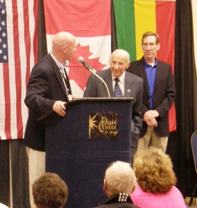 L-R: Kyle Case, CEO of Huntsman World Senior Games, John Morgan Jr., Marc Riker for National Senior Games Association at award at the advent of the Huntsman World Senior Games 2013, Dixie Center St. George, St. George, Utah, Oct. 6, 2013 | Photo courtesy of National Senior Games Association, St. George News