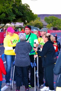 Center: Justin Tuft. Tuft was a former St. George Marathon competitor but, due to a motorcycle accident has been paralyzed and can no longer run. The  “I am ABLE Run, Walk ‘n Roll” race gave him the chance to experience victory again, crossing that St. George Marathon finish line. St. George, Utah, Oct. 5, 2013 | Photo by Jeremy Crawford, St. George News 