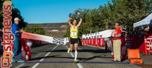 Record-setting winner Bryant Jensen crosses the finish line of the 37th St. George Marathon, St. George, Utah, Oct. 5, 2013 | Photo by Dave Amodt, St. George News