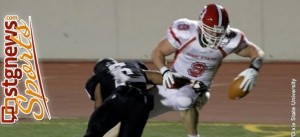 Dixie State's Joe Don Duncan takes a hit, Dixie State at Azusa Pacific, Glendora, Calif., Nov. 9, 2013 | Photo courtesy DSU Athletics