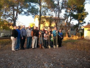 Candice Nay along with Habitat for Humanity members and sponsors pose in the Nay's new backyard, Washington City, Utah, Nov. 26, 2013 | Photo by Drew Allred, St. George News