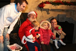 Ho, ho, ho said Santa to Paul Rumsey and family from Phoenix Arizona. They, along with other family members from Orem, Utah, are visiting the Bishop family and came to enjoy the Live Nativity at Tuacahn’s Christmas in the Canyon, Ivins, Utah, Nov 29, 2013 | Photo by John Teas, St. George 