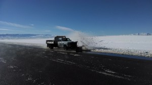 St. George Municipal Airport snow plow worked to clear the airport runway and taxiways of snow from heavy storm Dec. 7, 2013, St. George, Utah, Dec. 8, 2013 | Photo by and courtesy of Brad Kitchen, St. George Municipal Airport, St. George News