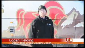 Desert Hills High School Coach Logan Fielding gives interview after night with track team stuck on I-15 in the Virgin River Gorge. Desert Hills High School, St. George, Utah, Dec. 8, 2013 |  Photo by Shane Brinkerhoff, St. George News