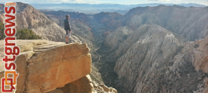 Josh Kitchen standing at the overlook near the halfway point of the hike. Red Mountain Trail, St. George, Utah, Dec. 22, 2013 | Photo by Drew Allred, St. George News