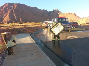 Firefighter salvaging a painting after the residential fire at 110 North Park Ave Way in The Palisades neighborhood of Ivins, Utah, Jan. 19, 2014 | Photo by Drew Allred, St. George News