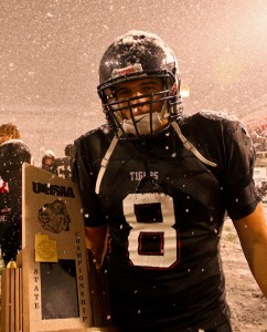 Former Hurricane star Brian Scott, shown with with the 2011 state championship football trophy, passed away early Tuesday morning. | File photo by Robert Hoppie, St. George News