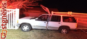 A vehicle crashed into a fence near Brigham Road, St. George, Utah, Jan. 29, 2014 |Photo by Scott Heinecke, St. George News