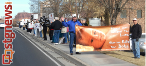 Pro-life advocates delivered their message before Planned Parenthood office on the 41st anniversary of the Supreme Court's decision in Roe v. Wade, St. George, Utah, Jan. 22, 2014 | Photo by John Teas, St. George News