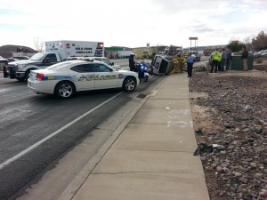 Emergency responders at a vehicle rollover near 352 E., Riverside Drive, St. George, Utah, Feb. 4, 2014 | Photo by Drew Allred, St. George News