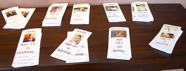 Brochures are provided on each child displayed in the gallery, St. George, Utah, March 21, 2014 | Photo by Rhonda Tommer, St. George News