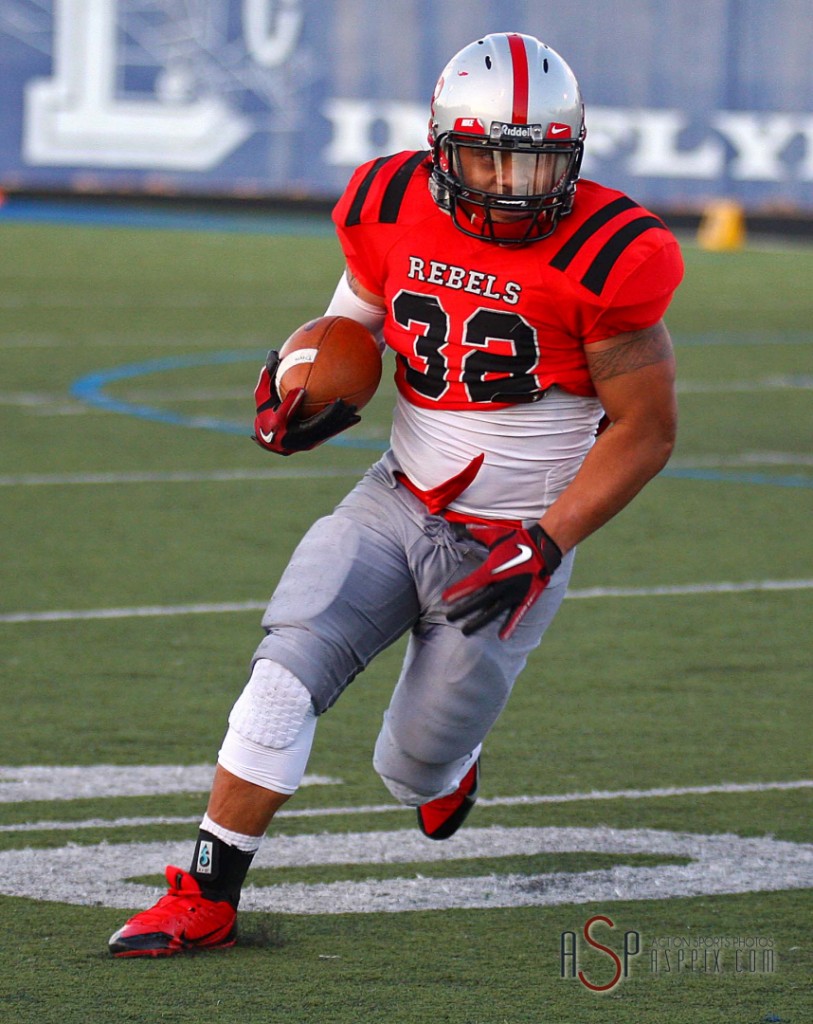 Rebels running back Rimo Mapu, Wasatch Revolution at Dixie Rebels, St. George, Utah, Apr. 5, 2014 | Photo by Robert Hoppie, St. George News