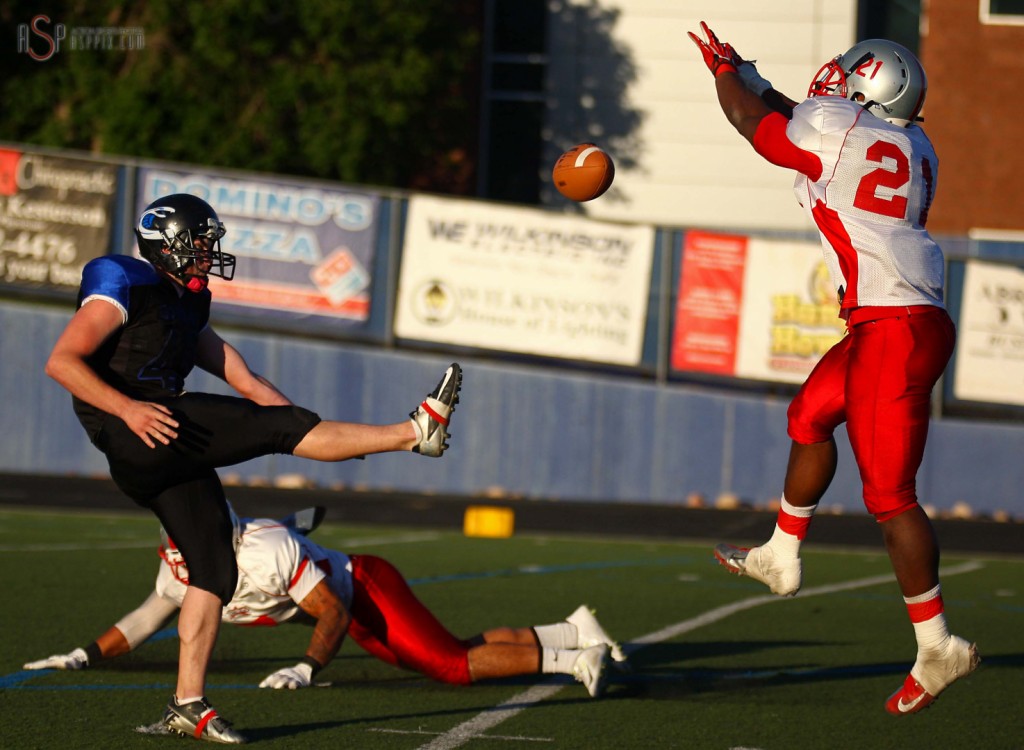 Dixie's Brandon Thompson nearly blocks a punt, Utah Cobras at Dixie Rebels, St. George, Utah, May 31, 2014 | Photo by Robert Hoppie, St. George News