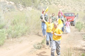 Children running alonside protest ride through Recapture Canyon. near Blanding, Utah, May 10, 2014 | Photo by Dallas Hyland, St. George News