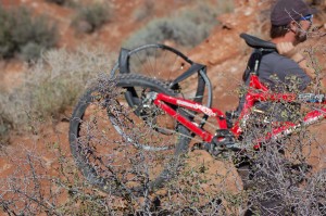 A bike belonging to rider Kelly McGarry of New Zealand gets mangled after a missed backflip on a 72-foot canyon gap at Red Bull Rampage, Virgin, Utah, Sept. 29, 2014 | All licensed images are printed with the express permission of Red Bull Media House North America Inc., Photo by Hollie Reina, St. George News