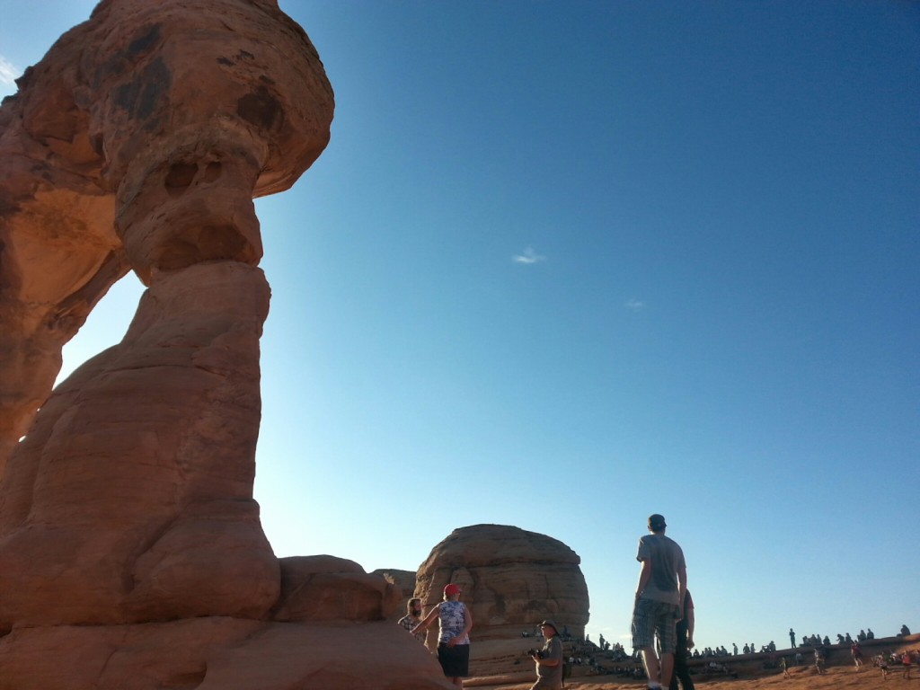 A crowd waits for the sunset near the end of the Delicate Arch Trail, Arches National Park, Utah, Sept. 14, 2014 | Photo by Drew Allred, St. George News