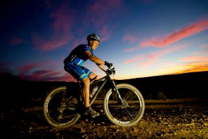 Bikers race into the sunset at the 25 Hours in Frog Hollow mountain bike race, Hurricane, Utah, Nov., 2013 | Photo courtesy of Sorenson Advertising, St. George News