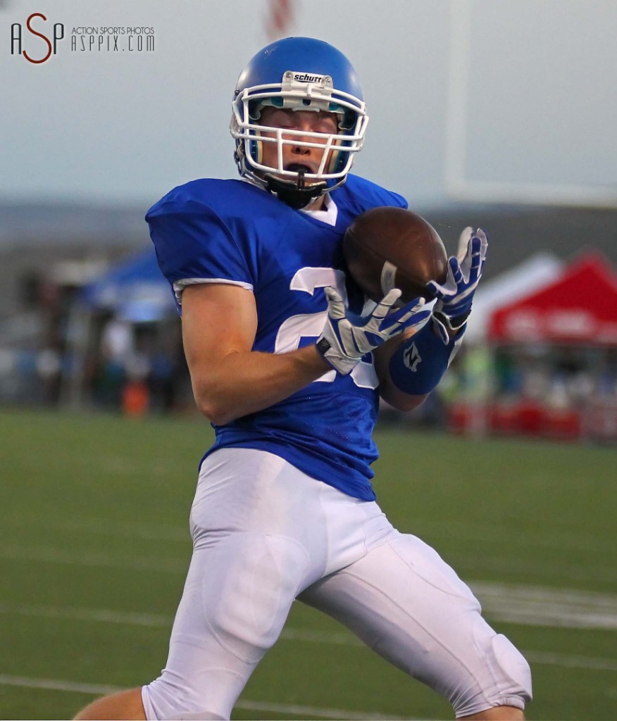 Konner Aitken pulls in a pass, Dixie vs. Desert Hills, St. George, Utah, Oct. 3, 2014 | Photo by Robert Hoppie, ASPpix.com, St. George News