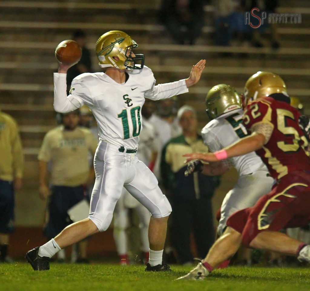 Jackson Nowatzke passes, Snow Canyon vs. Cedar, Cedar City, Utah, Oct. 9, 2014 | Photo by Robert Hoppie, ASPpix.com, St. George News