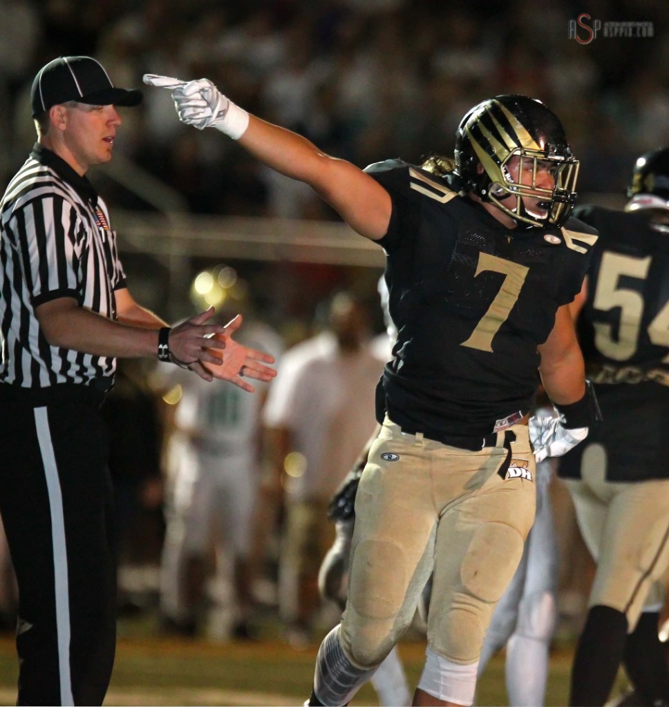 Thunder ball carrier Gabe Sewell signals first down late in the contest, Desert Hills vs. Snow Canyon,  St. George, Utah, Oct. 15, 2014 | Photo by Robert Hoppie, ASPpix.com, St. George News