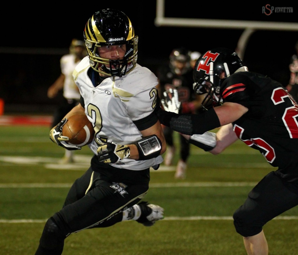 Mason Palmer looks for room to run after a catch, Desert Hills vs. Hurricane,  St. George, Utah, Oct. 24, 2014 | Photo by Robert Hoppie, ASPpix.com, St. George News