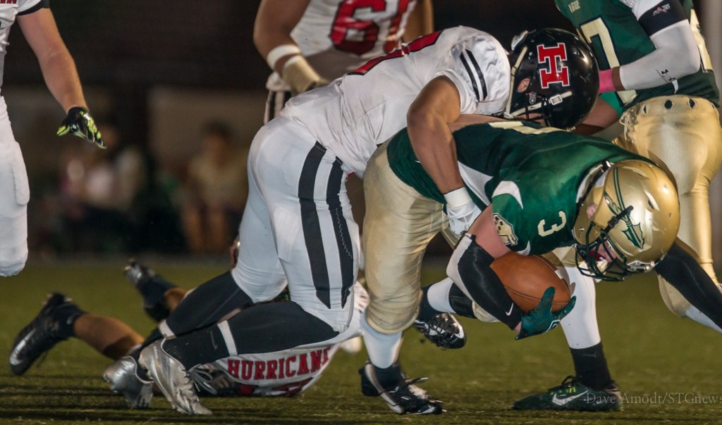 Josh Barnes is tackled, Hurricane at Snow Canyon, St. George, Utah, Oct. 3, 2014 | Photo by Dave Amodt, St. George News