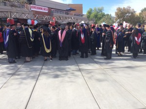 Students and staff congregating before the inauguration ceremony for university President Dr. Richard “Biff” Williams, M. Anthony Burns Arena, Dixie State University, St. George, Utah, Oct. 23, 2014 | Photo by Brett Brostrom, St. George News