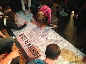 Hurricane High School students sign the a pledge to fight against pornography, Hurricane, Utah, Sept. 30, 2014 | Photo by Holly Coombs, St. George News