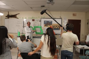 Matt Nickerson, playing the roll of the physics teacher in the production, acts out his roll as members of the production crew look on in  Cedar City High School on Oct. 14, 2014 | Photo by Devan Chavez, St. George News  