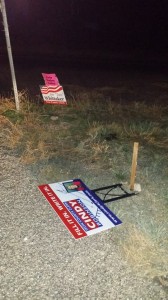 A campaign sign for Cindy Robinson knocked over while other signs remain up in the distance on Oct. 24, 2014 | Photo courtesy of City Robinson, St. George News