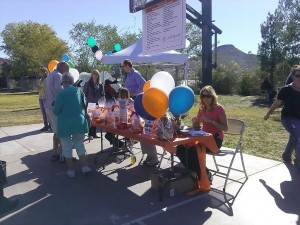 Guests sit at the ribbon cutting and United Way Dixie Charity Ball Drop at SwitchPoint located at 948 N. 1300 W. in St. George, Utah, Oct. 24, 2014 | Photo by Aspen Stoddard, St. George News