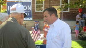 A constituent discusses issues with Washington County Commission candidate Victor Iverson, St. George, Utah, Oct. 11. 2014 | Photo by Mori Kessler, St. George News