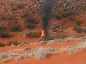 The Jeep Cherokee on fire just south of the intersection of state Route 7 and Sand Hollow Road, Utah, Nov. 2, 2014 | Photo courtesy of Casey Lofthouse, St. George News