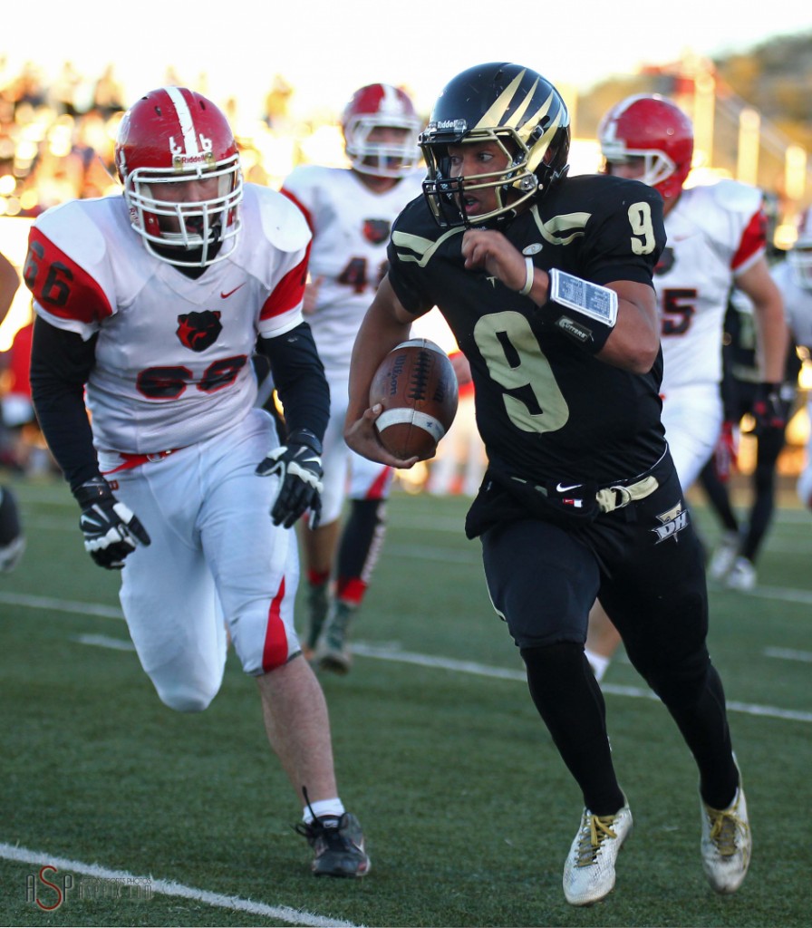 Thunder QB Nick Warmsley runs away from a Bear River defender, Desert Hills vs. Bear River,  St. George, Utah, Nov. 7, 2014 | Photo by Robert Hoppie, ASPpix.com, St. George News