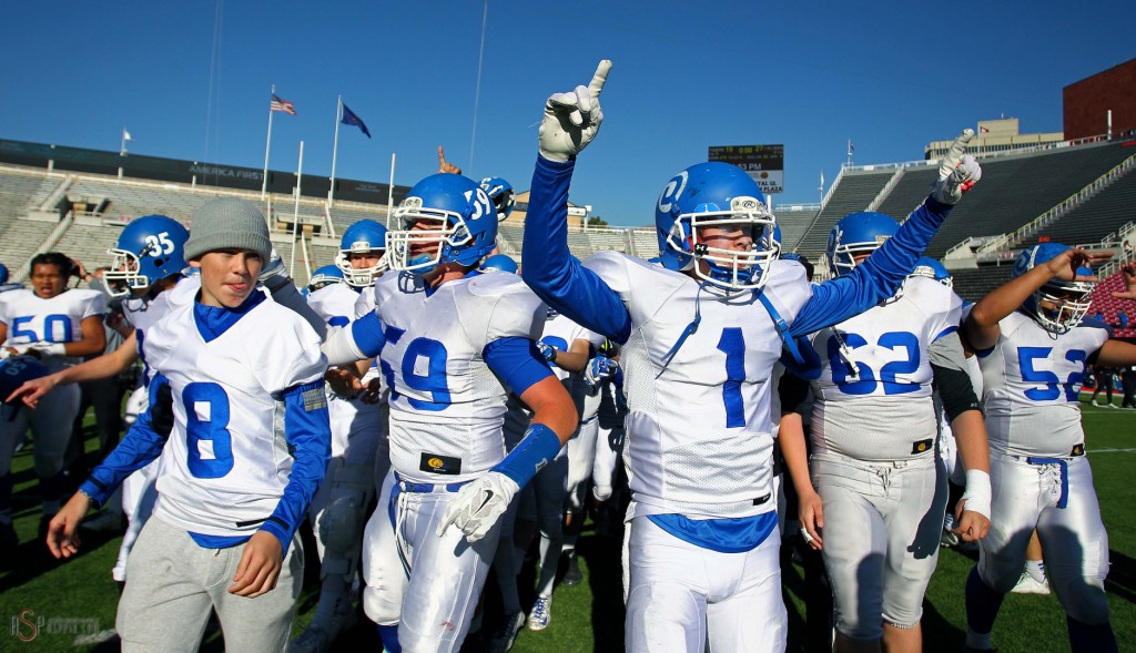 RJ Wilgar (1) and the Flyers celebrate their state championship victory over Hurricane, Dixie vs. Hurricane, 2014 3AA Football State Championship, Salt Lake City, Utah, Nov. 21, 2014 | Photo by Robert Hoppie, ASPpix.com, St. George News