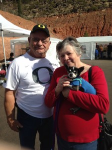 Jerry and ReNee Sprague hold "Earl," whom they adopted at the Mega Pet Adoption event, St. George, Utah, Nov. 14, 2014 | Photo by Holly Coombs, St. George News