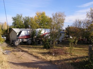 A cement truck crashes through fences and hits a power line before coming to a stop in the yard of a residence, Veyo, Utah, Nov. 13, 2014 | Photo courtesy of Utah Highway Patrol, for St. George News