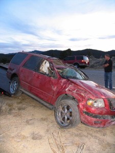 A red SUV occupied by two teenagers and two toddlers rolled along Highway 56 near New Castle, New Castle, Utah, Nov. 27, 2014 | Photo by Carin Miller, St. George News