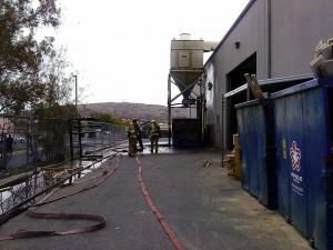 Firefighters respond to  a reported dumpster fire at the Riverwoods Mill in the Fort Pierce Industrial Park, St. George, Utah, Nov. 22, 2014 | Photo by Aspen Stoddard, St. George News