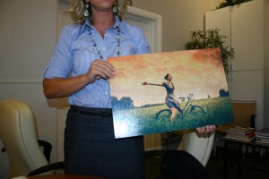 Stefanie Bevans displays a wooden photo print at Steamroller Copies, St. George, Utah, Oct. 1, 2014 | Photo by Cami Cox Jim, St. George News