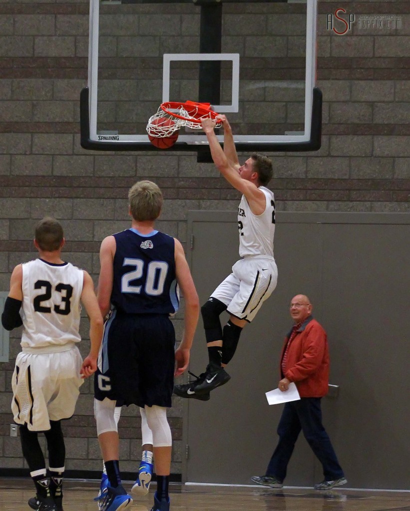 Thunder F Quincy Mathews takes the opening tip in for a dunk, Desert Hills vs. Centennial, Nev, Boys Basketball, St. George, Utah, Dec. 2, 2014 | Photo by Robert Hoppie, ASPpix.com, St. George News