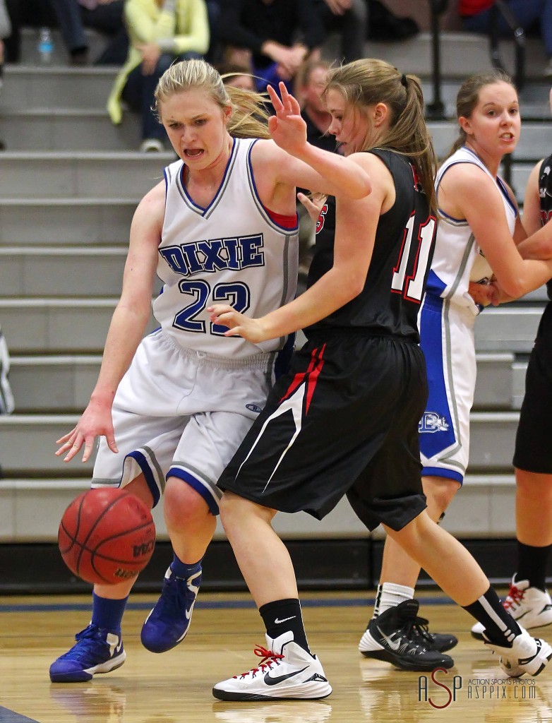 Flyer F Alexa Estridge (22) drives around Hurricane G Jayden Langford (11), Dixie vs. Hurricane, Girls Basketball, St. George, Utah, Dec. 9, 2014 | Photo by Robert Hoppie, ASPpix.com, St. George News